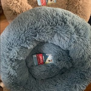 Dog bed donut shaped.  Brand new with tag!  Only brown left